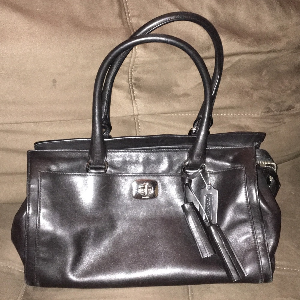 Black medium sized coach handbag